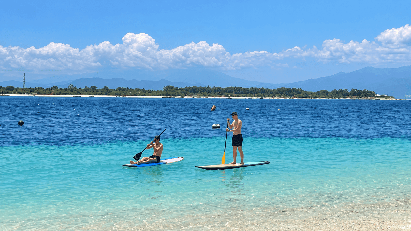 Paddleboarding in turquoise waters