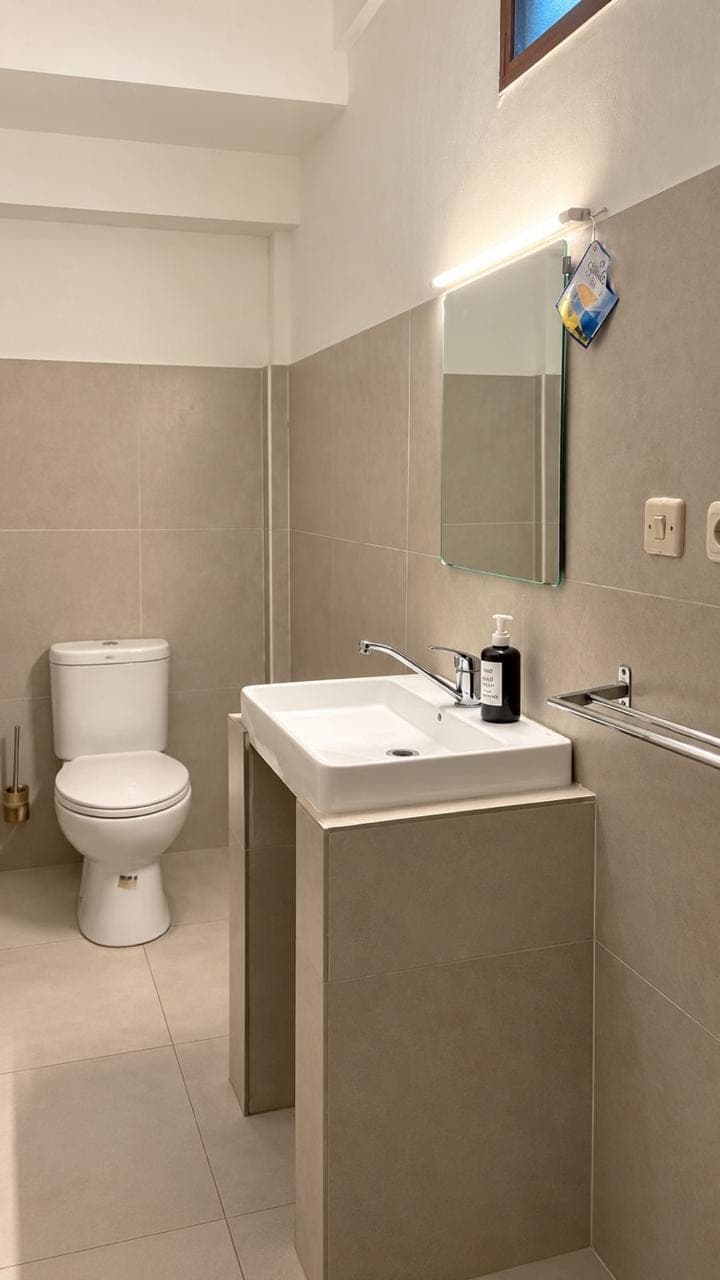 Clean and comfortable private bathroom with fresh hot shower